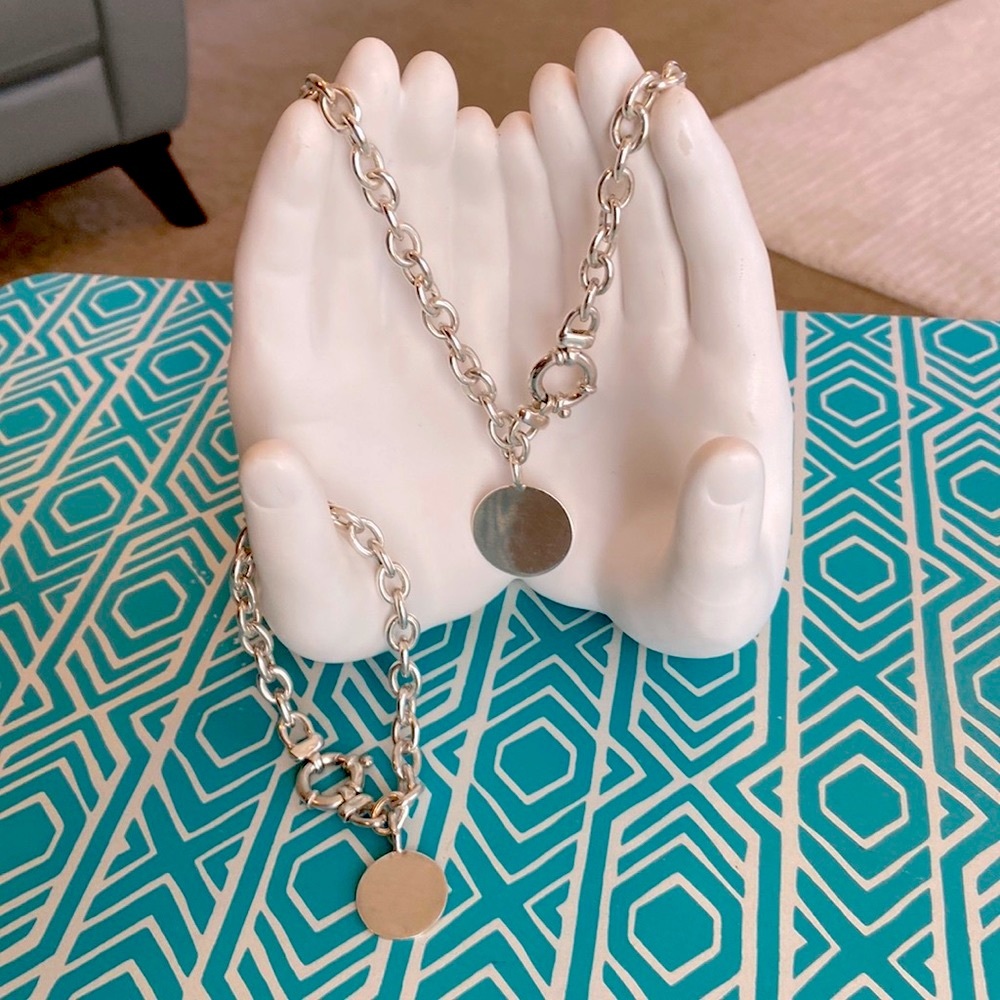 Silver plated, trendy necklace with matching bracelet.